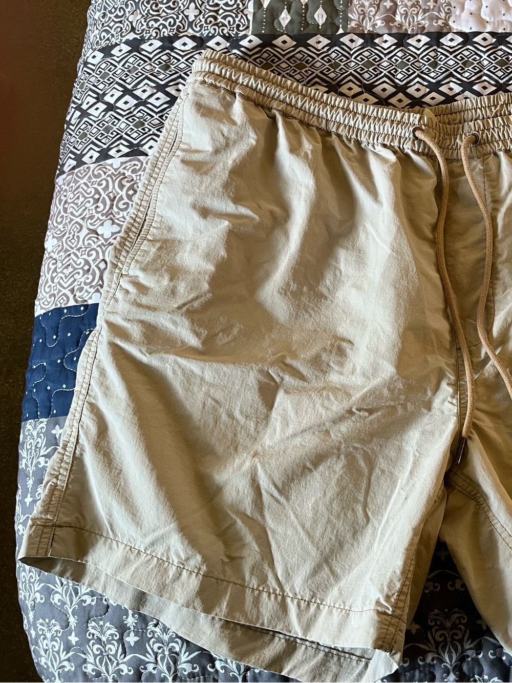 Two Pairs of Madewell Men's Drawstring Shorts - Beige and very dark olive.